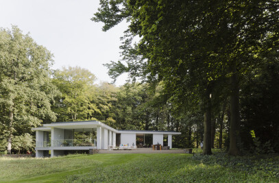 Villa anchored in forest landscape